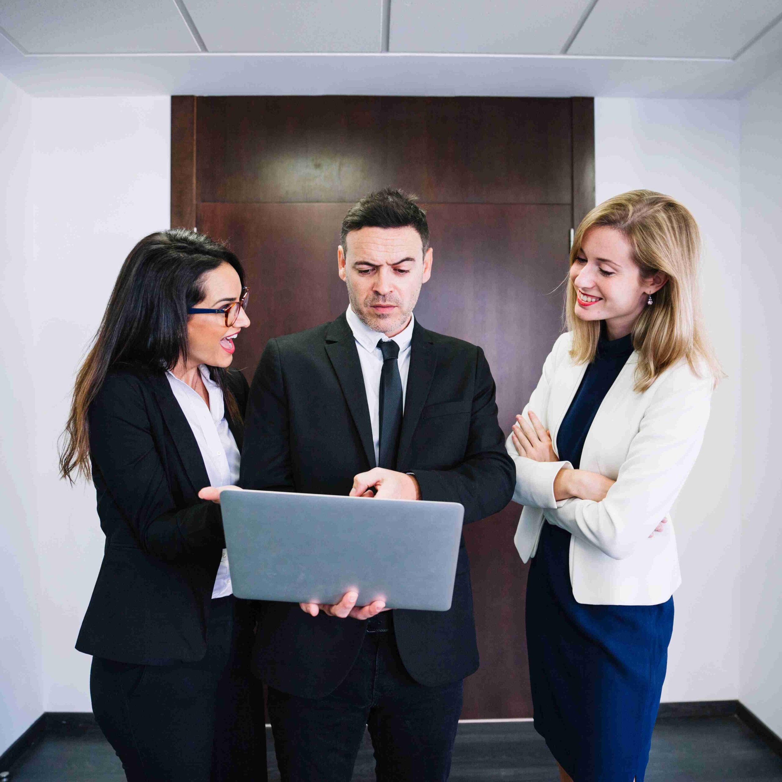 corporate-business-people-looking-laptop_11zon